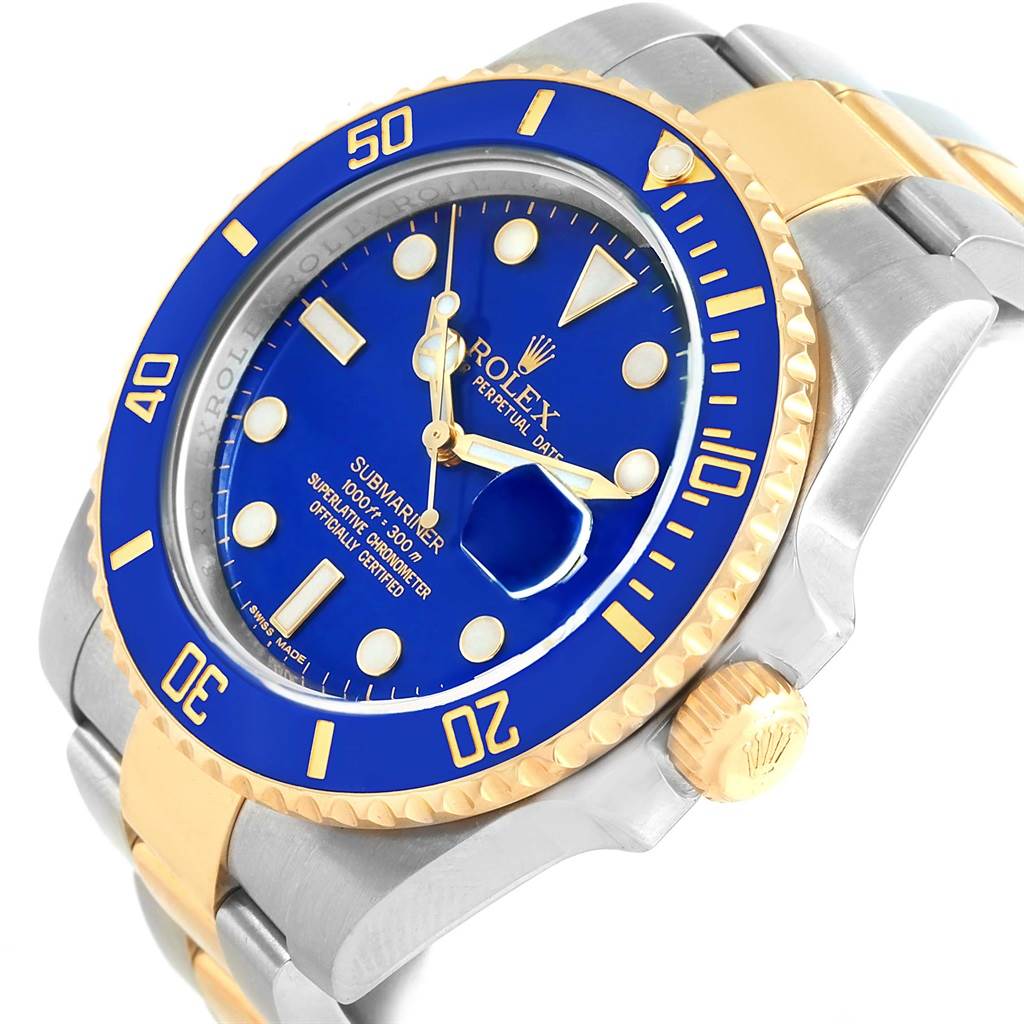 The Rolex Submariner 116613 Men's Steel and Gold (two tone) Blue Dial 116613 Men's Steel and Gold (two tone) Blue Dial watch is shown at a slight angle from the upper right, highlighting its blue dial, bezel, gold crown, and two-tone bracelet.