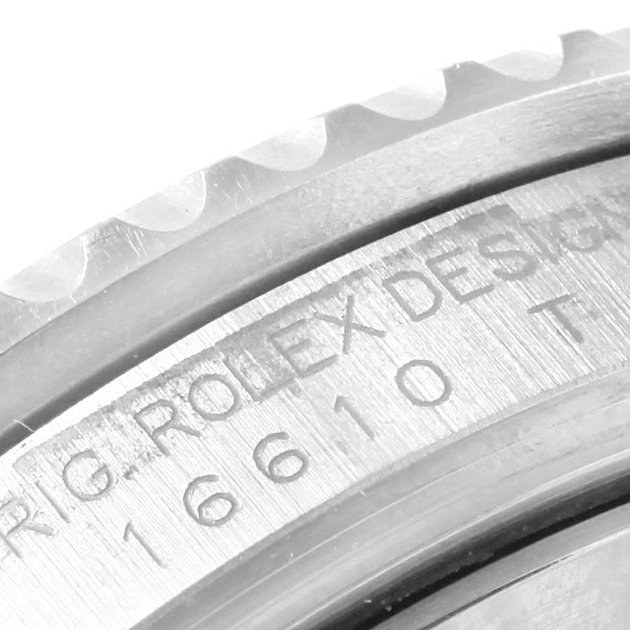 This close-up image shows part of the bezel and case side of a Rolex Submariner 16610LV Men's Stainless Steel Black Dial 16610LV Men's Stainless Steel Black Dial watch, revealing the engraved model number 16610.