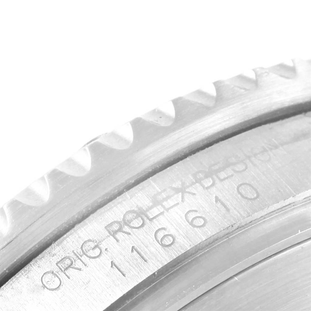 The image shows a close-up of the side bezel and case engraving of a Rolex Submariner 116610LV Men's Stainless Steel Green Dial 116610LV Men's Stainless Steel Green Dial watch.