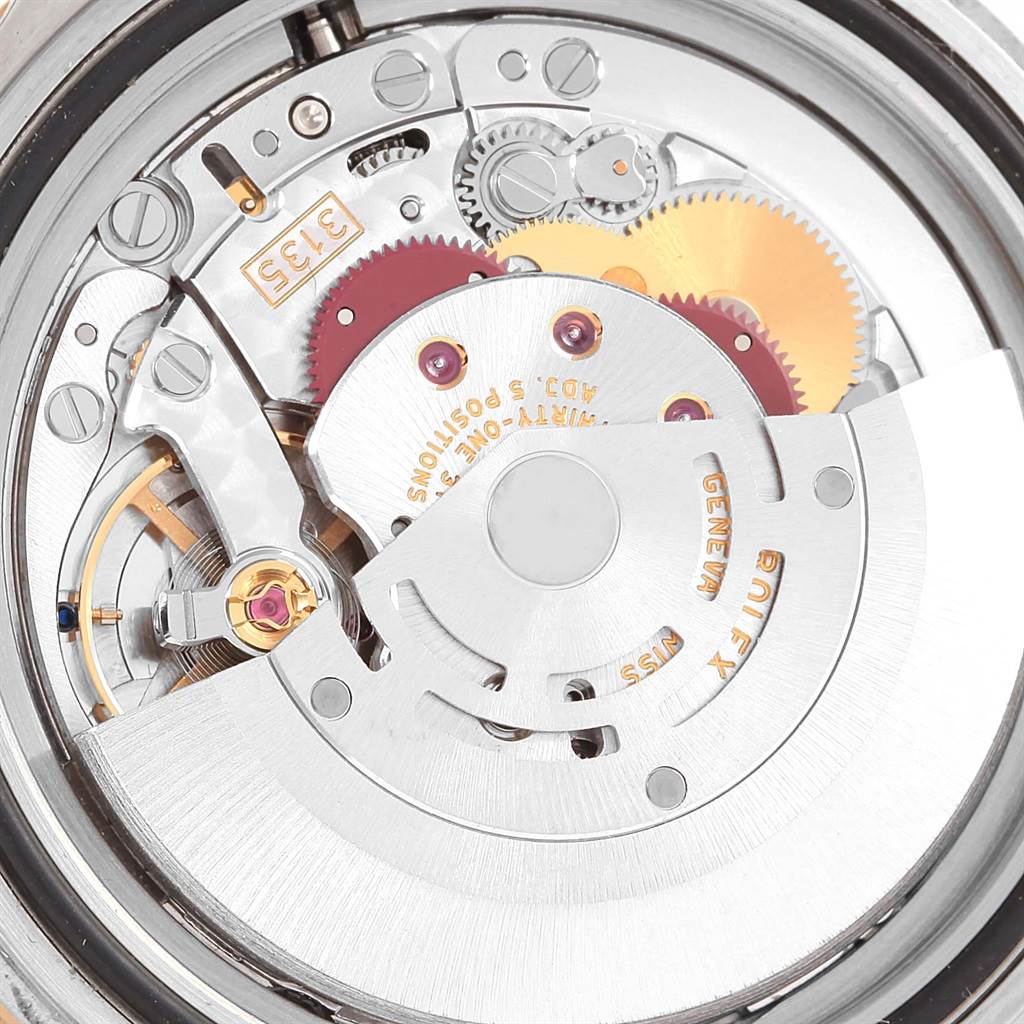 The image shows the internal mechanical movement of a Rolex Submariner 16613 Men's Steel and Gold (two tone) Grey Dial 16613 Men's Steel and Gold (two tone) Grey Dial watch.