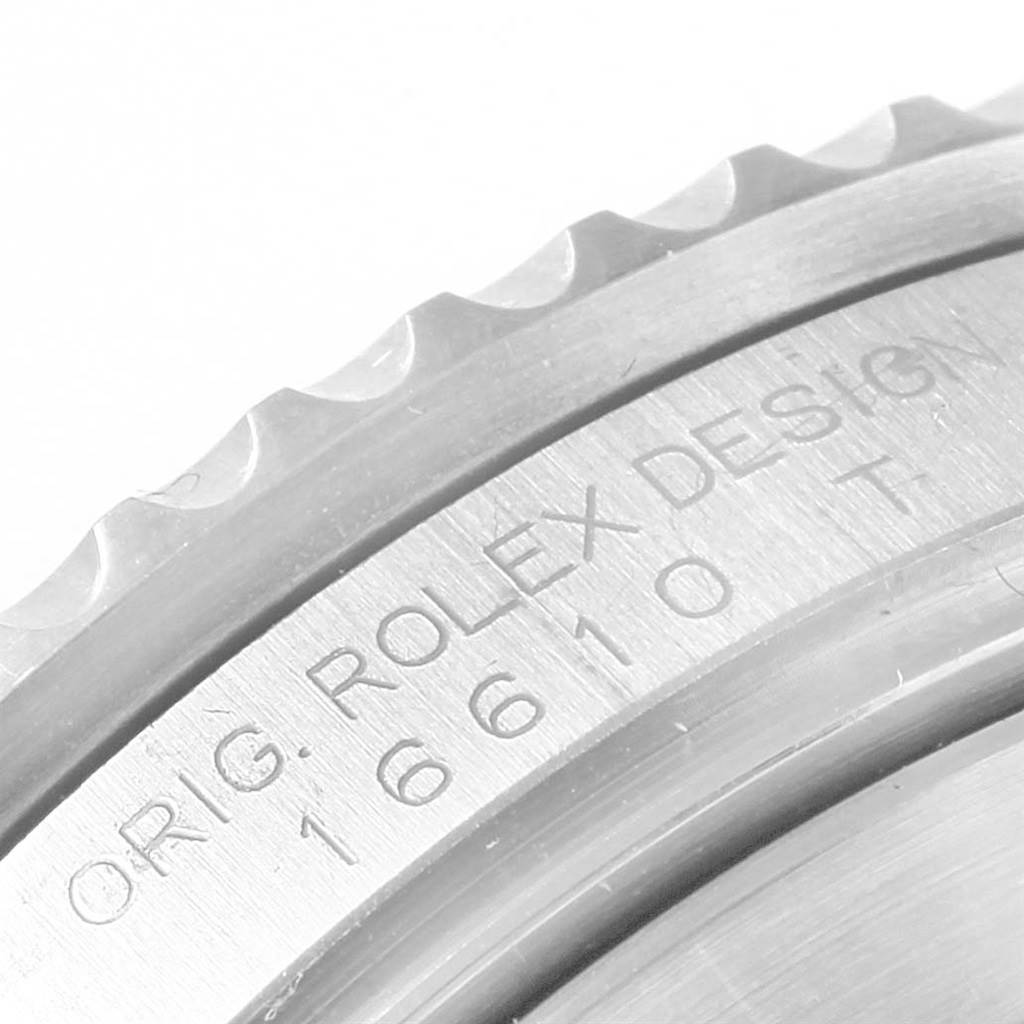 The image shows a close-up view of the engraved bezel on a Rolex Submariner 16610LV Men's Stainless Steel Black Dial 16610LV Men's Stainless Steel Black Dial model.