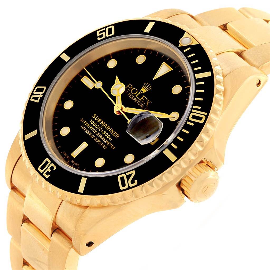This image shows a close-up side angle of a gold Rolex Submariner 16618 Men
s Yellow Gold Black Dial 16618 Men
s Yellow Gold Black Dial, highlighting the bezel, dial, crown, and bracelet.