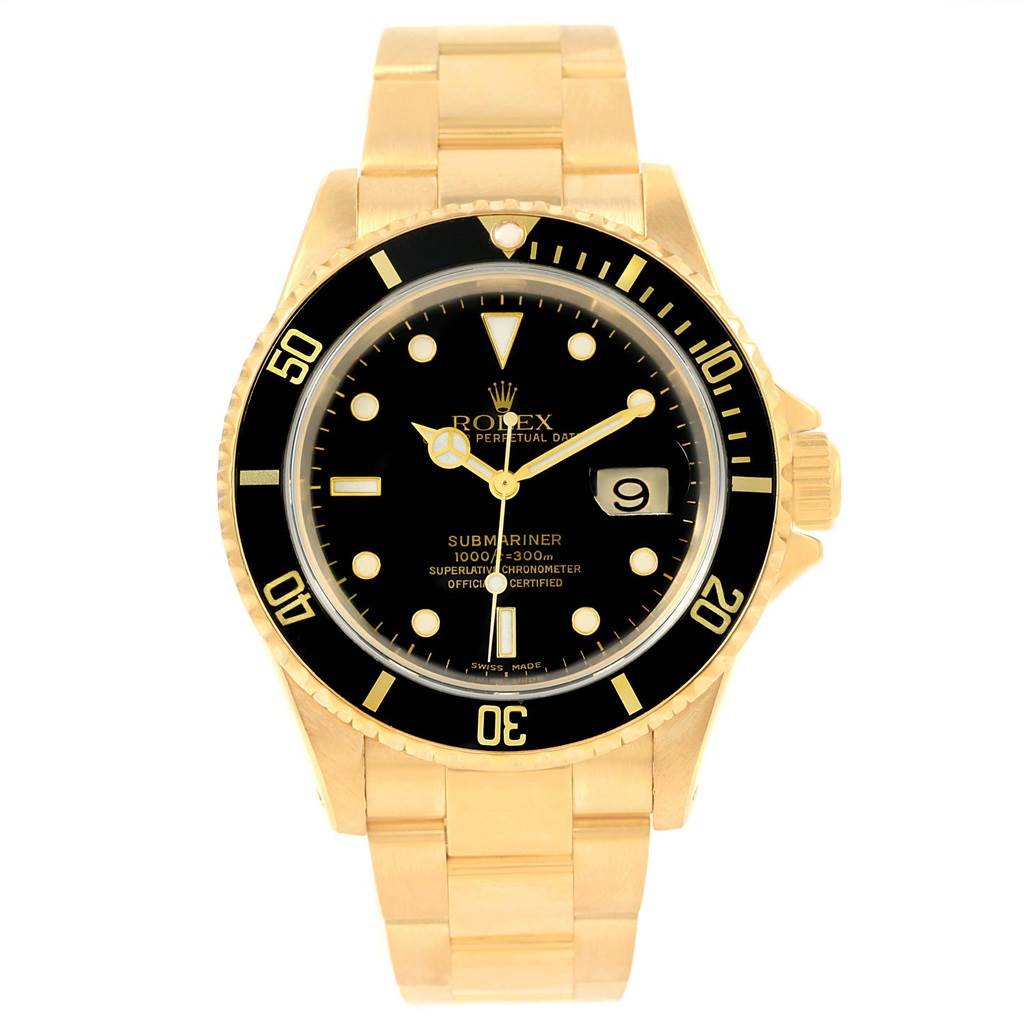 This is a frontal view of a Rolex Submariner 16618 Men
s Yellow Gold Black Dial 16618 Men
s Yellow Gold Black Dial watch showcasing its black dial, gold-tone case, bezel, and bracelet.