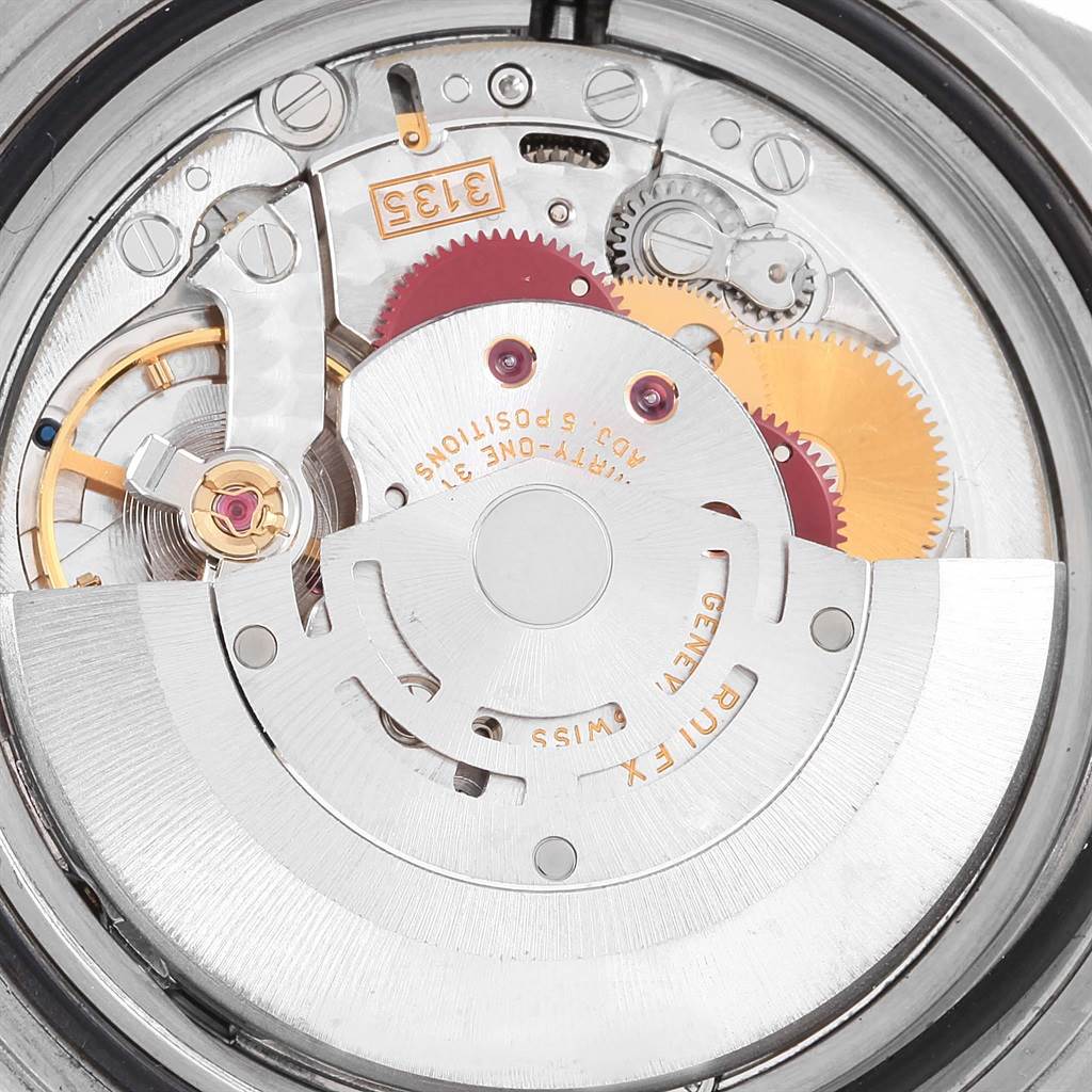 The image shows the internal mechanism and movement of a Rolex Submariner 16610 Men's Stainless Steel Black Dial 16610 Men's Stainless Steel Black Dial watch from a rear or open-case angle.