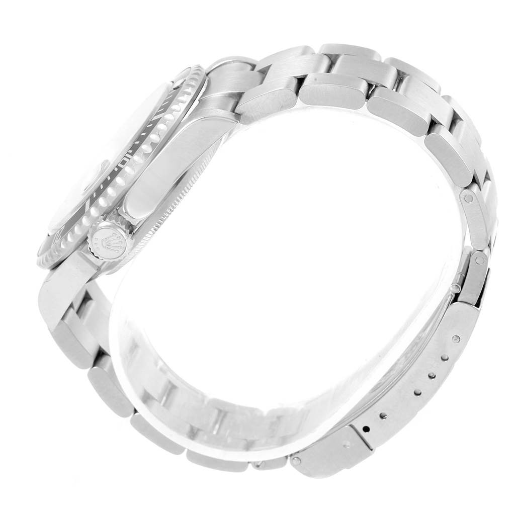 This image shows a side view of the Rolex Submariner 16610 Men's Stainless Steel Black Dial 16610 Men's Stainless Steel Black Dial watch, highlighting its bracelet, case, crown, and clasp.