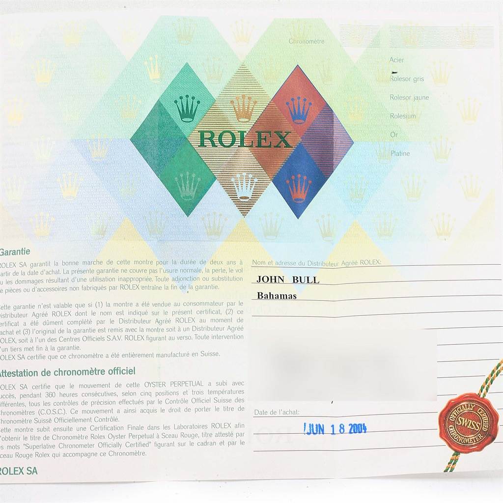 This image shows a warranty card for a Rolex Submariner 16613 Men's Steel and Gold (two tone) Blue Dial 16613 Men's Steel and Gold (two tone) Blue Dial watch.