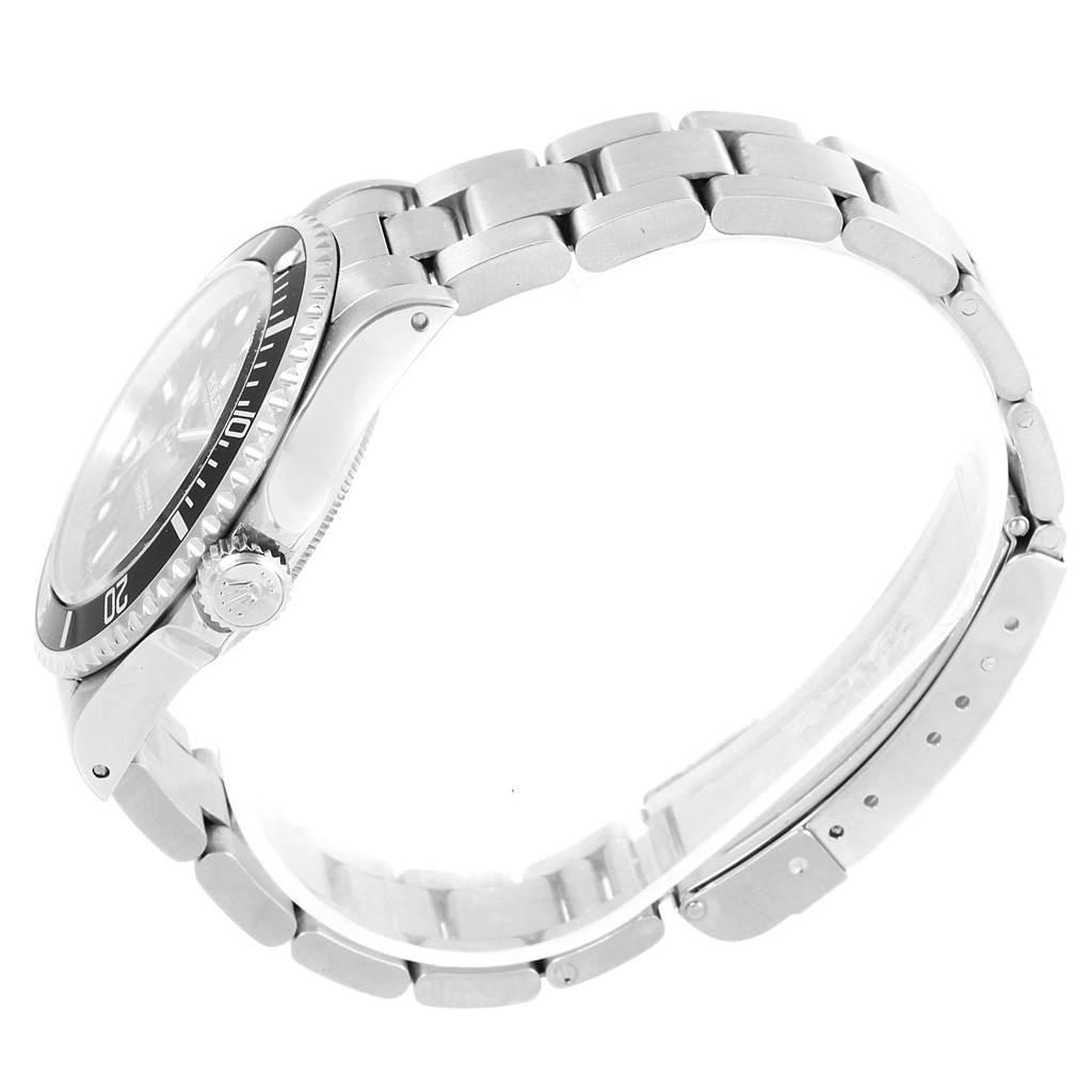 This image shows a side view of a Rolex Submariner 14060 Men's Stainless Steel Black Dial 14060 Men's Stainless Steel Black Dial watch detailing its bezel, crown, and metal bracelet.