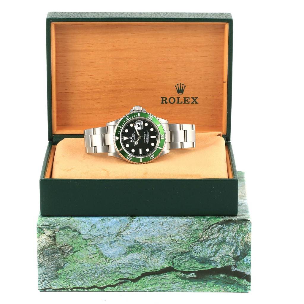 This image shows a Rolex Submariner 16610LV Men's Stainless Steel Black Dial 16610LV Men's Stainless Steel Black Dial watch featuring its face and bracelet, presented inside an open Rolex box.