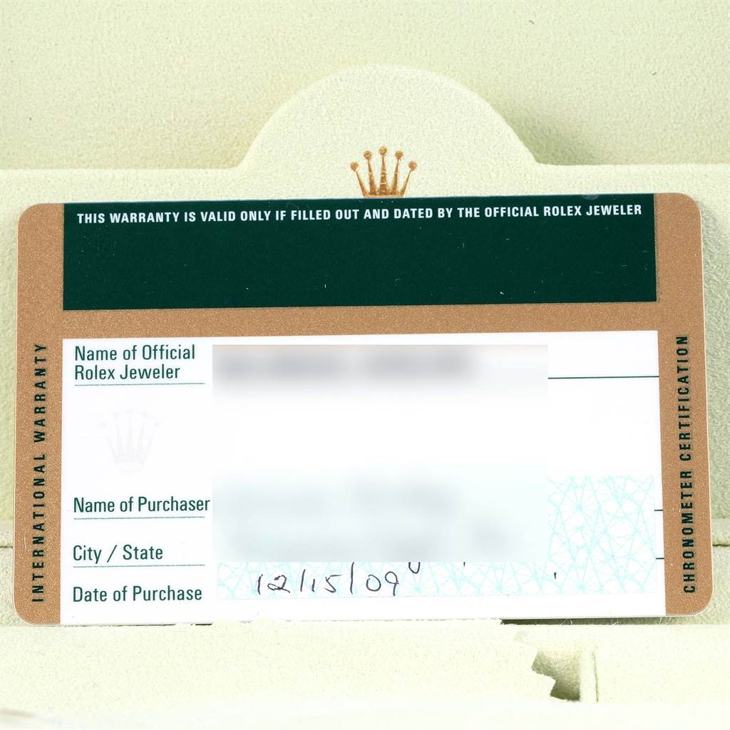 The image shows the warranty card for the Rolex Submariner 16613 Men's Steel and Gold (two tone) Blue Dial 16613 Men's Steel and Gold (two tone) Blue Dial watch, including details like the jeweler's name, purchaser's name, and date of purchase.