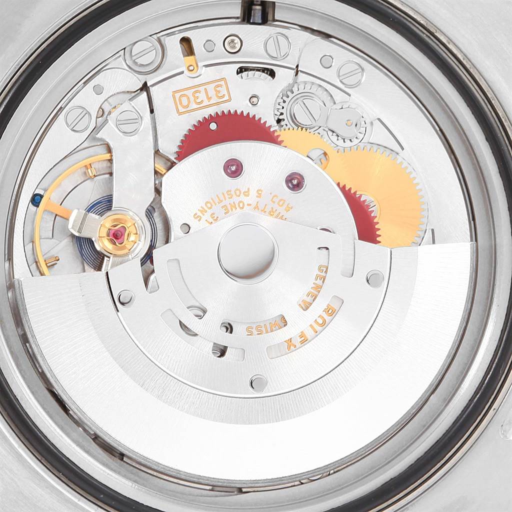 This image shows the intricate internal mechanism and movement of a Rolex Submariner 114060 Men's Stainless Steel Black Dial 114060 Men's Stainless Steel Black Dial watch from a back angle.