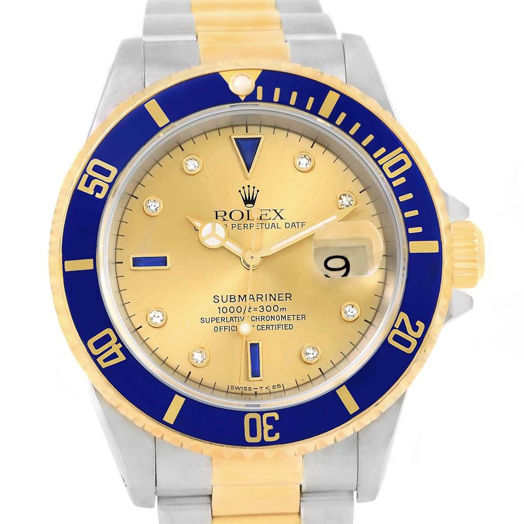 This image shows a front view of a Rolex Submariner 16613 Men's Steel and Gold (two tone) Champagne Dial 16613 Men's Steel and Gold (two tone) Champagne Dial watch, highlighting the dial, bezel, case, and part of the bracelet.