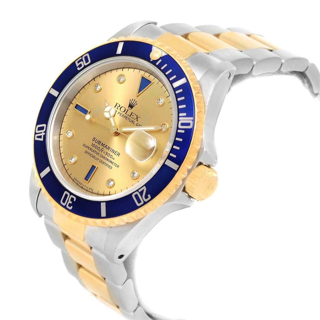 This image shows a Rolex Submariner 16613 Men's Steel and Gold (two tone) Champagne Dial 16613 Men's Steel and Gold (two tone) Champagne Dial watch angled to highlight the face, bezel, crown, and part of the bracelet.
