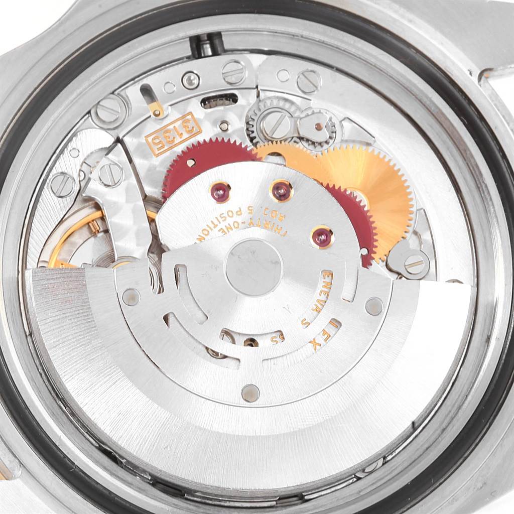This image shows a close-up view of the internal mechanism of a Rolex Submariner 16613 Men's Steel and Gold (two tone) Black Dial 16613 Men's Steel and Gold (two tone) Black Dial watch from the back.