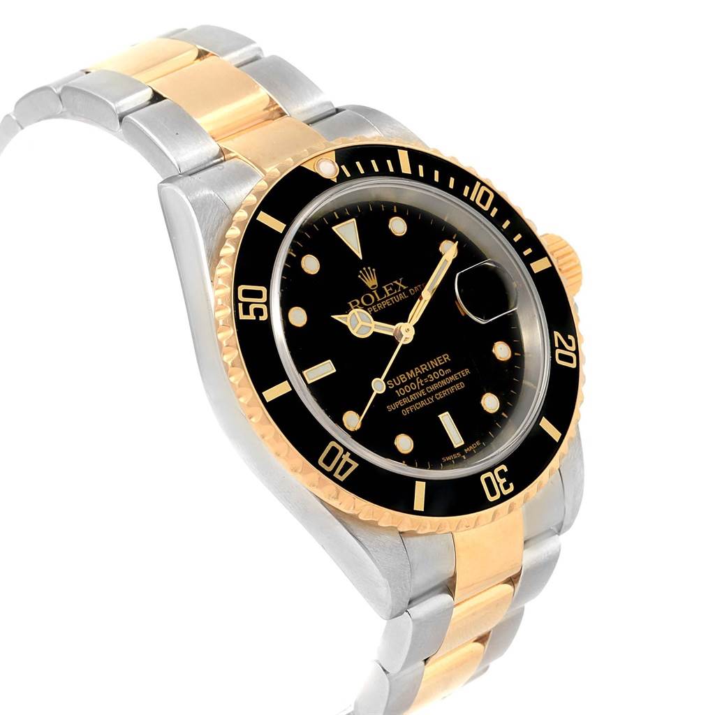 This image shows a Rolex Submariner 16613 Men's Steel and Gold (two tone) Black Dial 16613 Men's Steel and Gold (two tone) Black Dial watch at an angle highlighting its dial, bezel, and part of its two-tone bracelet.