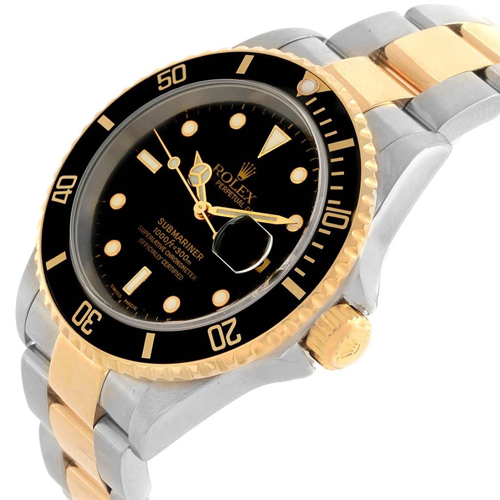 The image shows a Rolex Submariner 16613 Men's Steel and Gold (two tone) Black Dial 16613 Men's Steel and Gold (two tone) Black Dial watch at an angled view, highlighting the dial, bezel, crown, and bracelet.