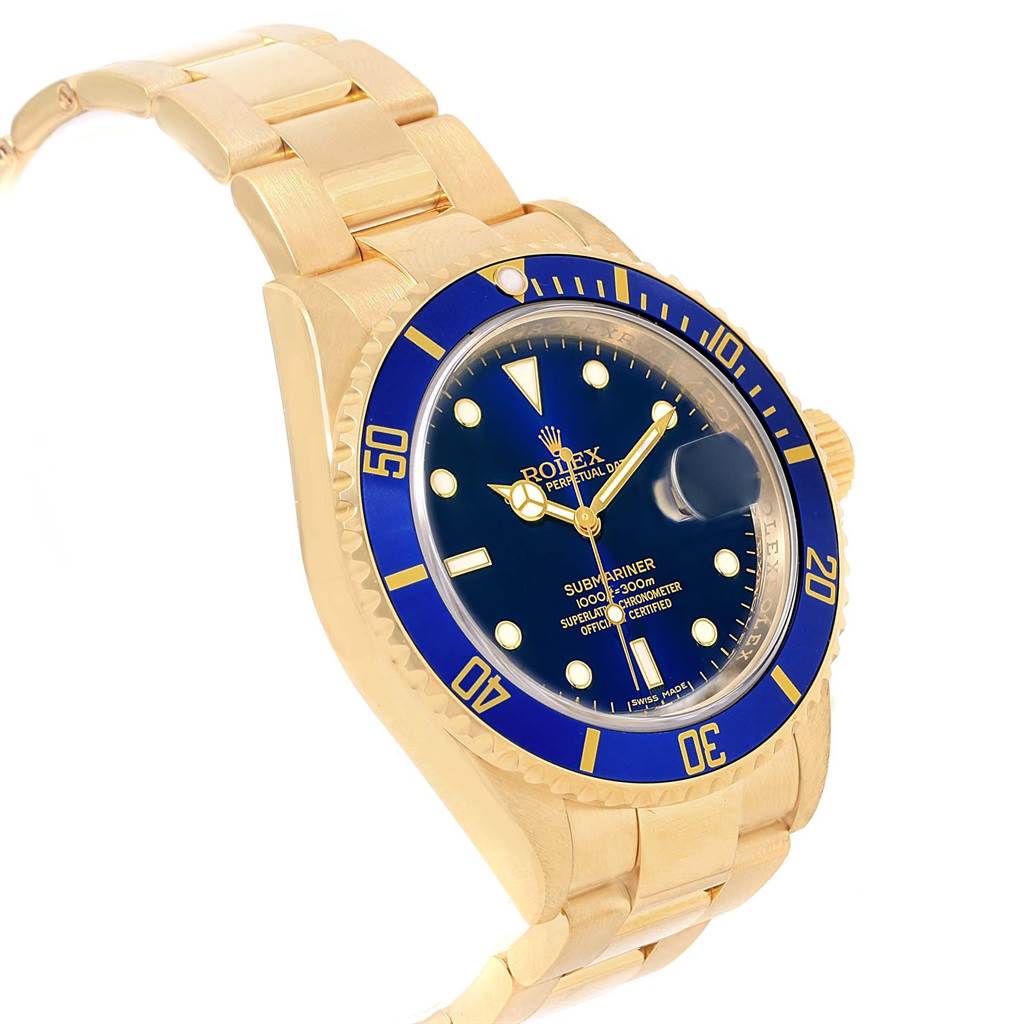The Rolex Submariner 16618 Men's Yellow Gold Blue Dial 16618 Men's Yellow Gold Blue Dial watch is shown from the front-left angle, displaying its blue dial, gold casing, and bracelet.