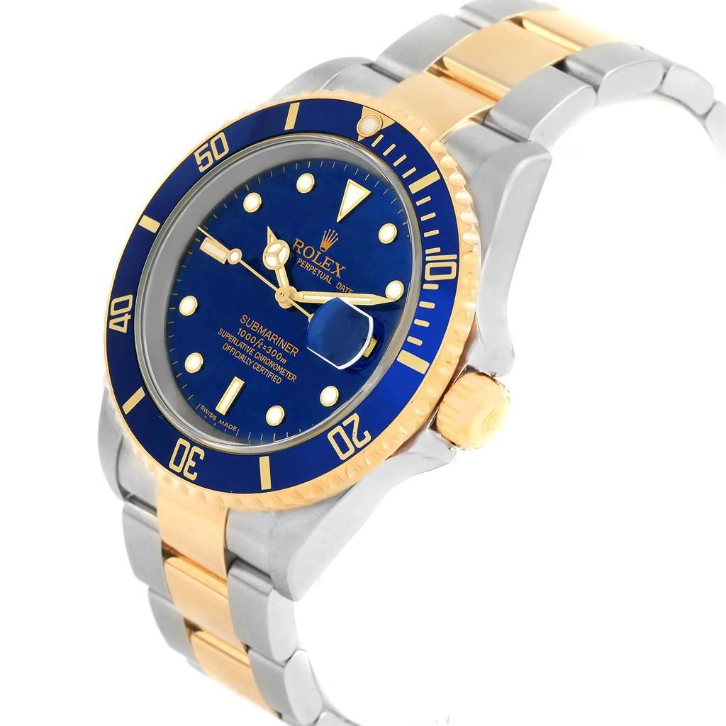 The image shows a Rolex Submariner 16613 Men's Steel and Gold (two tone) Blue Dial 16613 Men's Steel and Gold (two tone) Blue Dial watch at a front-side angle, highlighting its blue dial and bezel, gold accents, and bracelet.