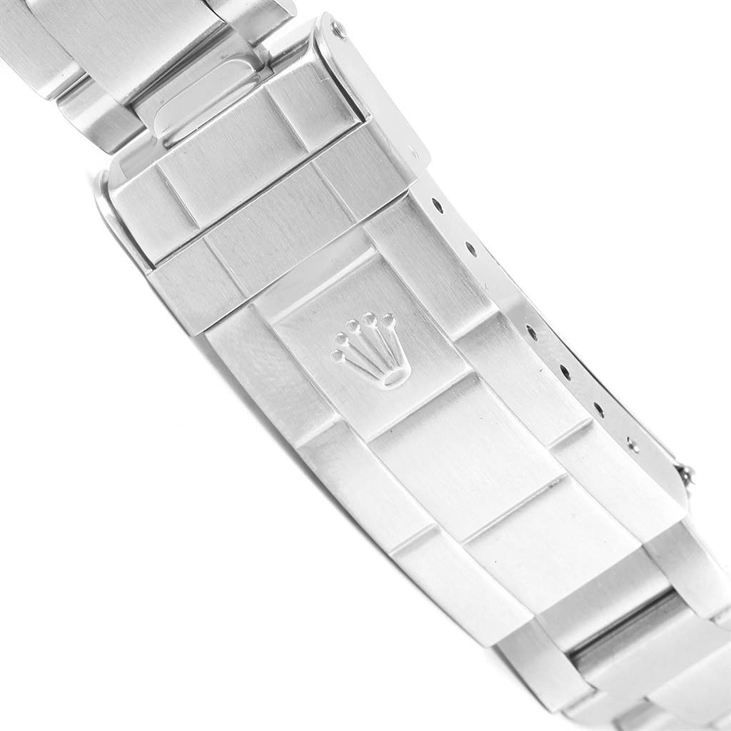 This image shows the clasp and bracelet of a Rolex Submariner 16610 Men's Stainless Steel Black Dial 16610 Men's Stainless Steel Black Dial watch from a close-up side angle.