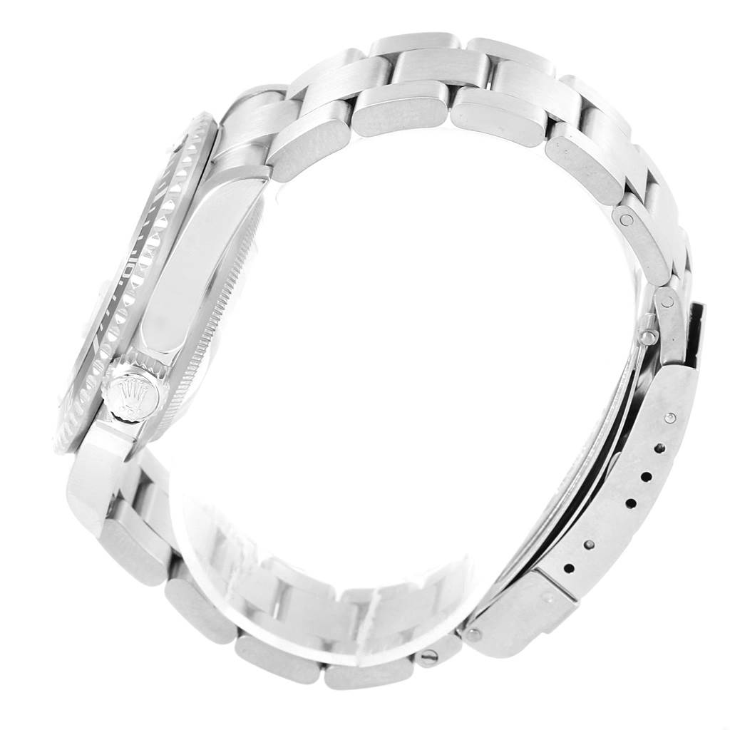 This image shows a side view of a Rolex Submariner 16610 Men's Stainless Steel Black Dial 16610 Men's Stainless Steel Black Dial watch, highlighting its bezel, crown, and metal bracelet clasp.