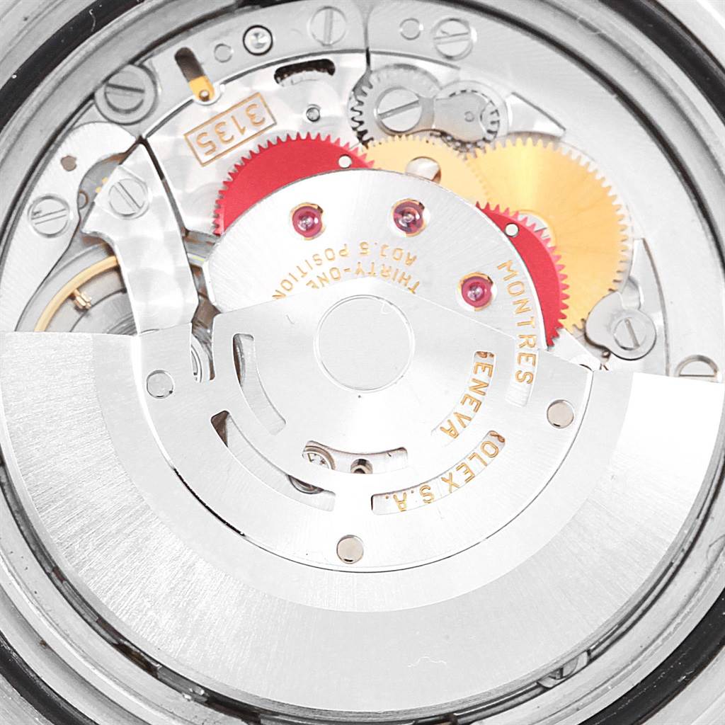 This image shows the intricate internal mechanism of a Rolex Submariner 16610 Men's Stainless Steel Black Dial 16610 Men's Stainless Steel Black Dial watch viewed from the back.