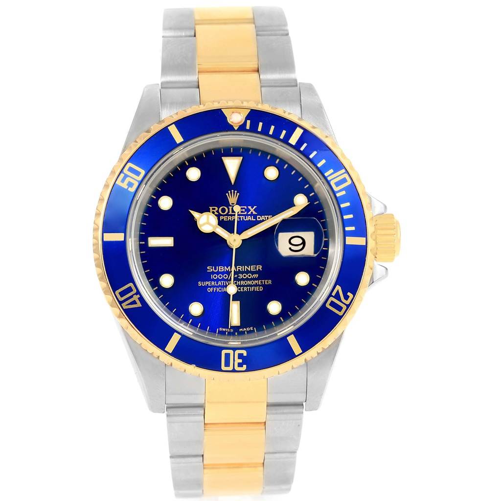 The image shows a front view of a Rolex Submariner 16613 Men's Steel and Gold (two tone) Blue Dial 16613 Men's Steel and Gold (two tone) Blue Dial watch, featuring its blue dial, date display, and two-tone bracelet.