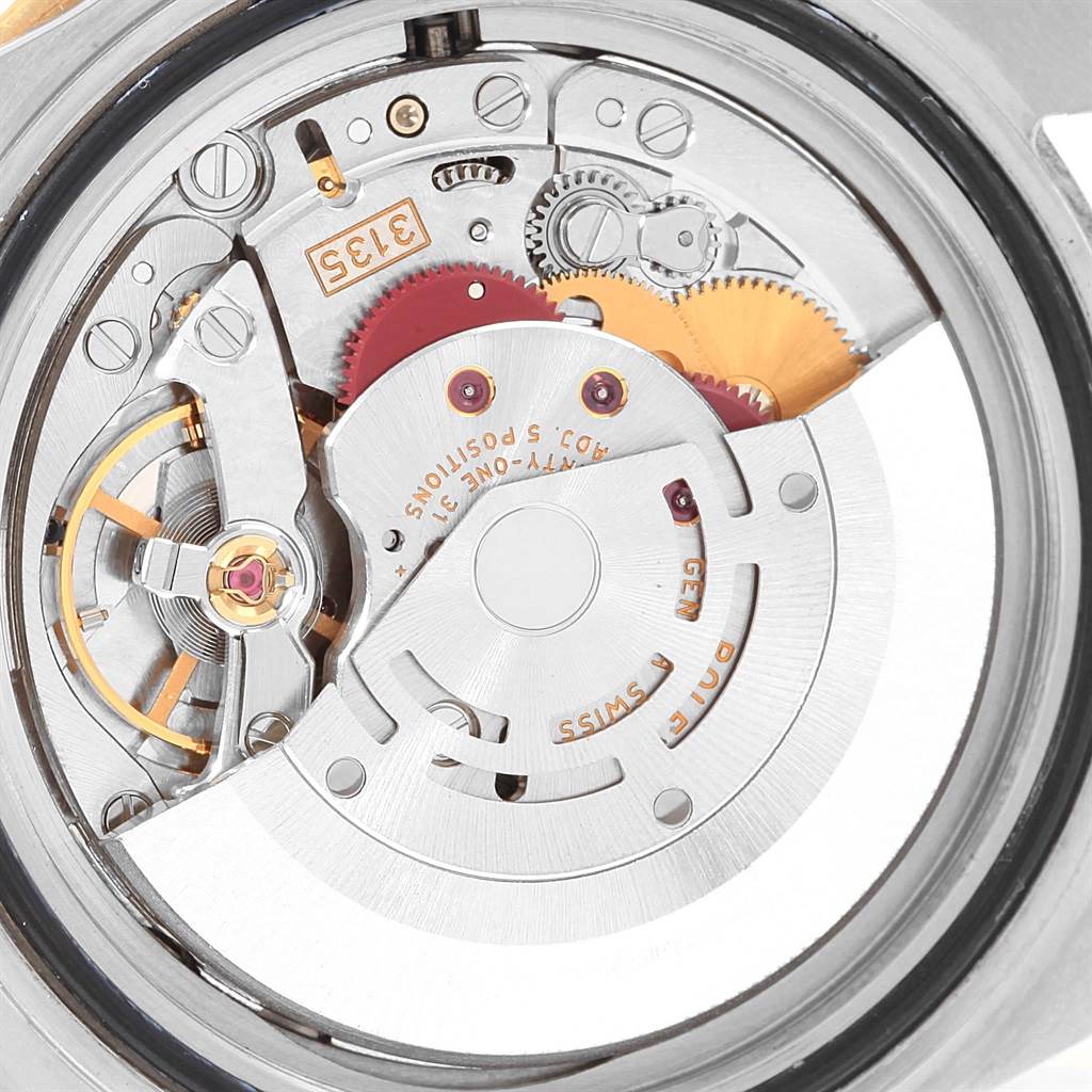 This image shows the inner mechanical movement of a Rolex Submariner 16613 Men's Steel and Gold (two tone) Black Dial 16613 Men's Steel and Gold (two tone) Black Dial watch from a close-up, top-down angle.