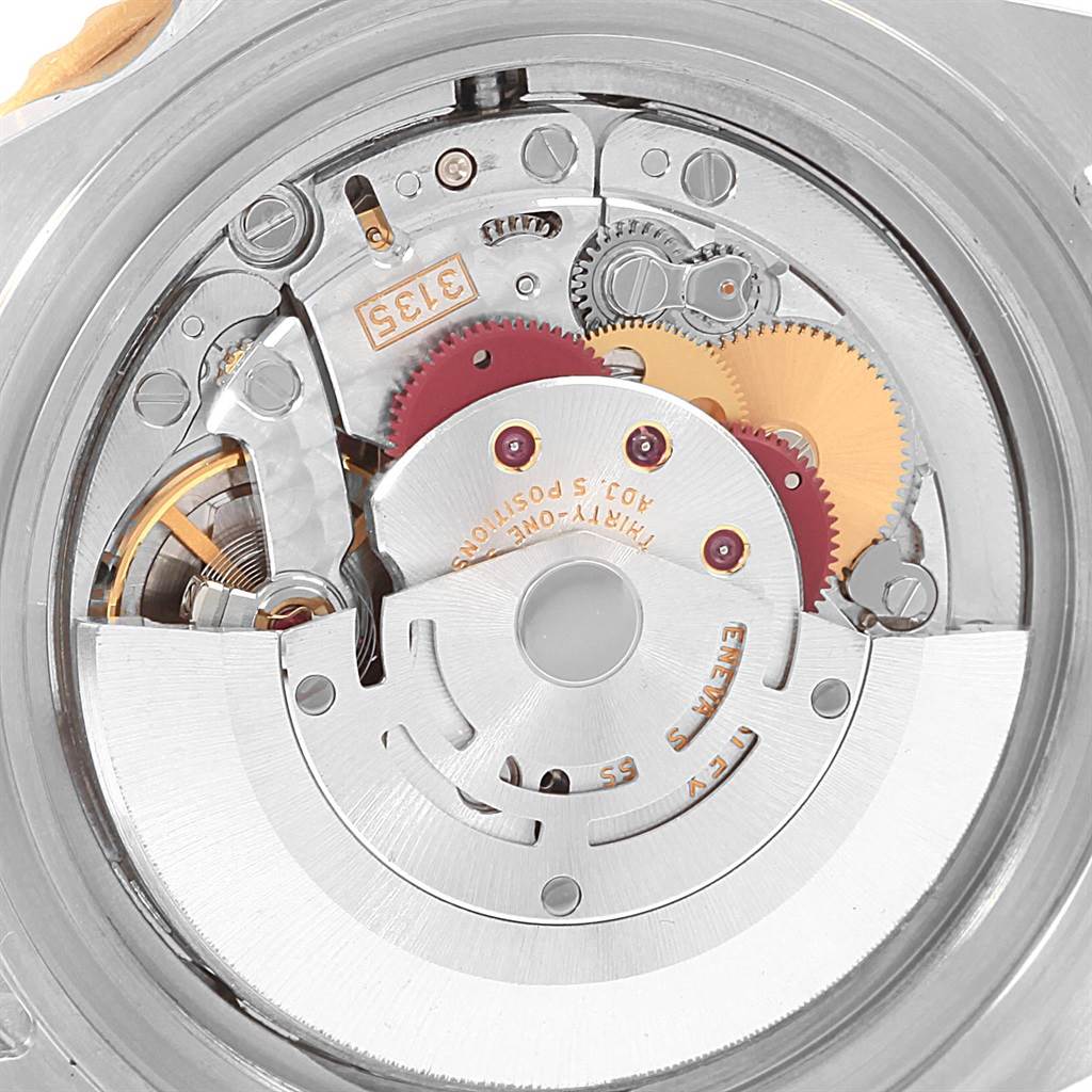The image shows the internal mechanical movement of the Rolex Submariner 16613 Men's Steel and Gold (two tone) Blue Dial 16613 Men's Steel and Gold (two tone) Blue Dial watch, viewed from the back.