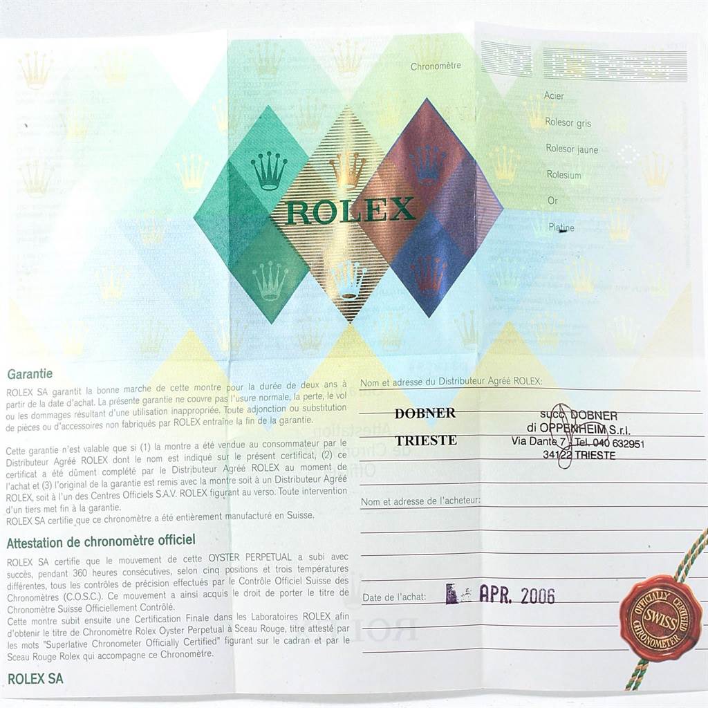 This is an image of the guarantee and certification document for a Rolex Submariner 16613 Men's Steel and Gold (two tone) Blue Dial 16613 Men's Steel and Gold (two tone) Blue Dial watch, showing warranty details and authorized dealer information.