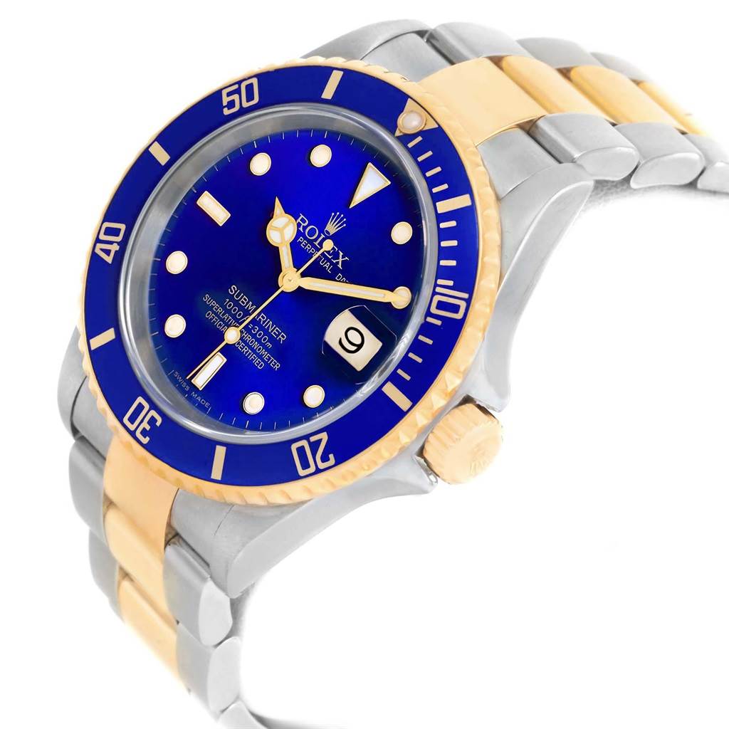The image shows a side-angle view of a Rolex Submariner 16613 Men's Steel and Gold (two tone) Blue Dial 16613 Men's Steel and Gold (two tone) Blue Dial watch, highlighting its blue dial, bezel, and two-tone bracelet.