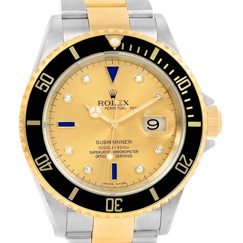 This image shows a frontal view of a Rolex Submariner 16613 Men's Steel and Gold (two tone) Champagne Dial 16613 Men's Steel and Gold (two tone) Champagne Dial watch, highlighting its bezel, dial, hands, and bracelet.