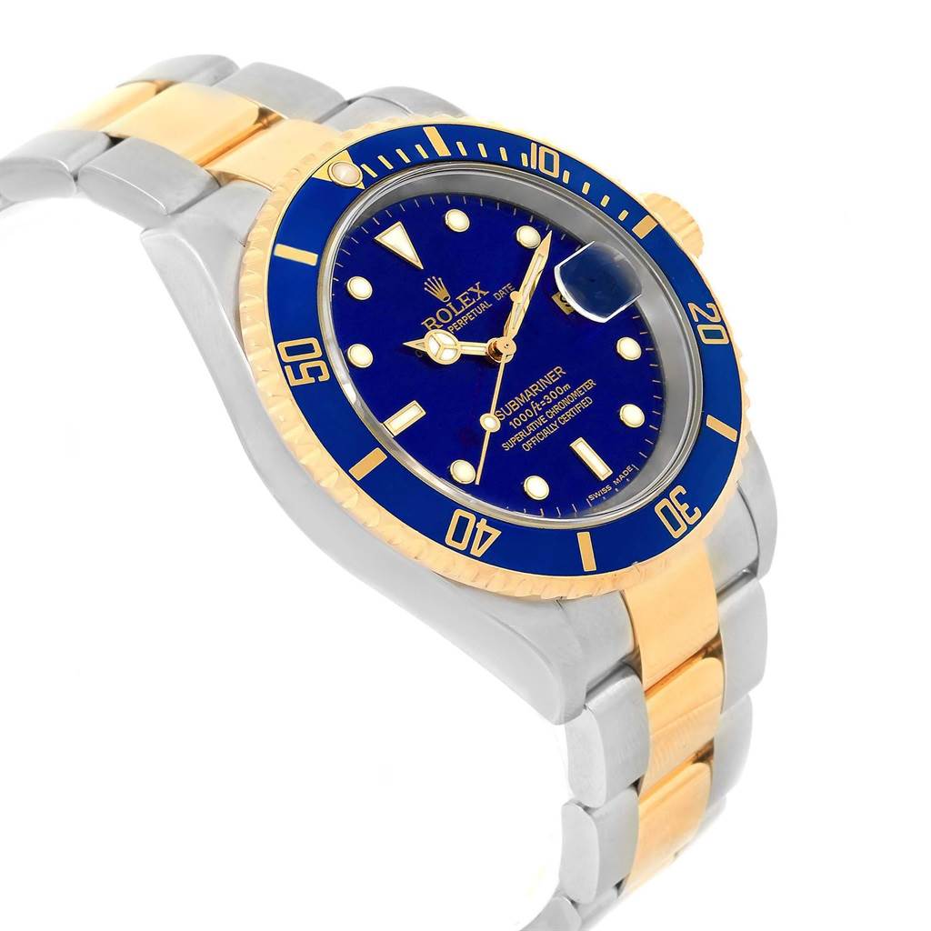 The Rolex Submariner 16613 Men's Steel and Gold (two tone) Blue Dial 16613 Men's Steel and Gold (two tone) Blue Dial watch is shown at an angle highlighting the dial, bezel, and part of the bracelet with a blue and gold color scheme.