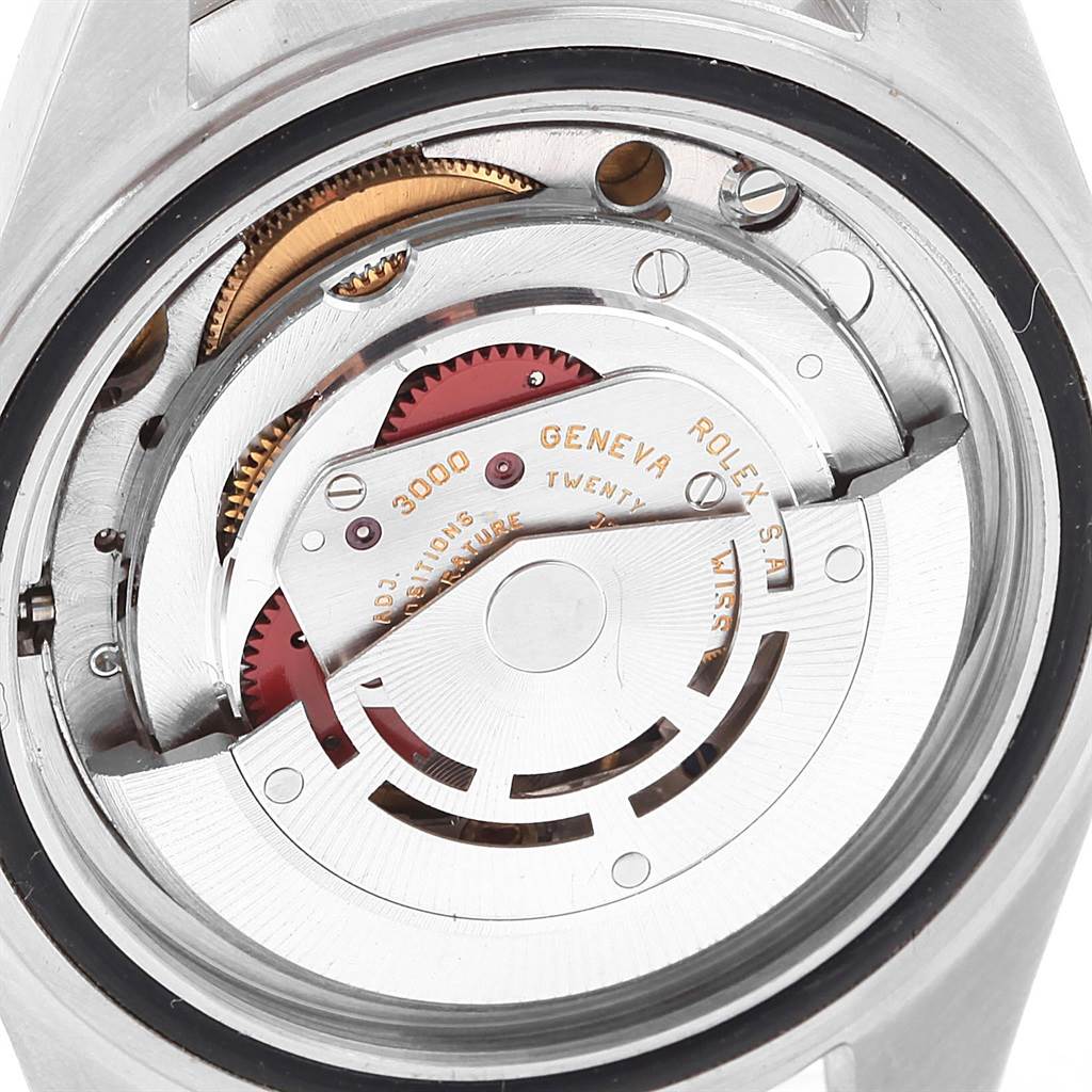 This image shows the internal movement and mechanism of a Rolex Submariner 14060 Men's Stainless Steel Black Dial 14060 Men's Stainless Steel Black Dial watch from a rear angle.