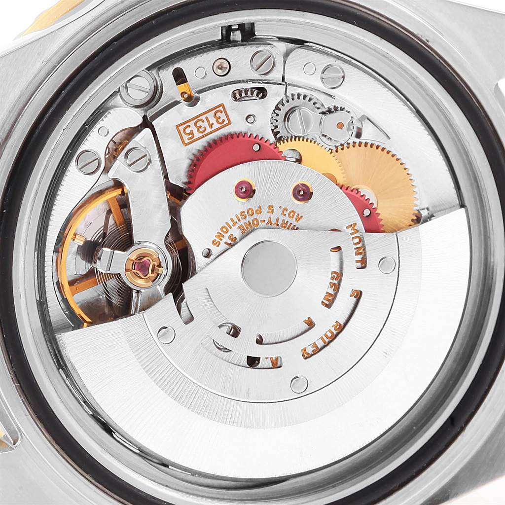 This image shows the internal mechanical movement of the Rolex Submariner 16613 Men's Steel and Gold (two tone) Blue Dial 16613 Men's Steel and Gold (two tone) Blue Dial watch viewed from the back.