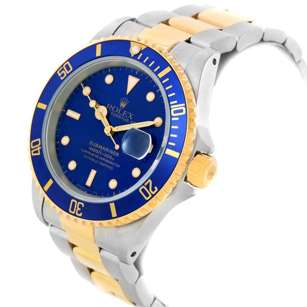 The image shows a side-angle view of the Rolex Submariner 16613 Men's Steel and Gold (two tone) Blue Dial 16613 Men's Steel and Gold (two tone) Blue Dial watch, highlighting its blue dial, bezel, and two-tone bracelet.