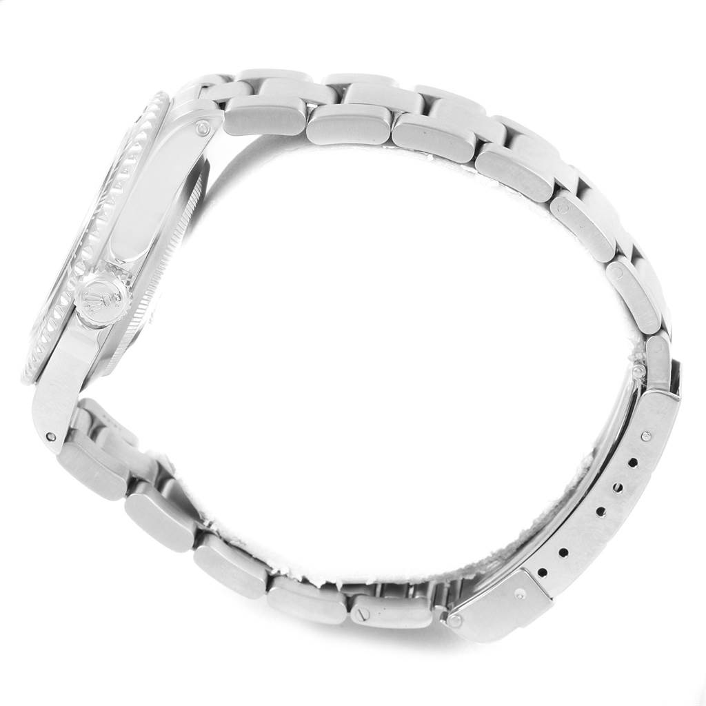 The image shows a side view of the Rolex Submariner 14060 Men's Stainless Steel Black Dial 14060 Men's Stainless Steel Black Dial, focusing on its metal bracelet, clasp, and bezel.