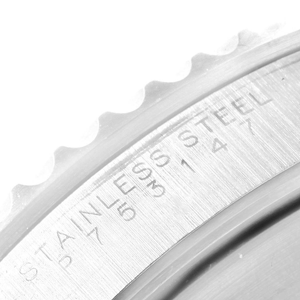This close-up image shows part of the bezel and engraved markings on a Rolex Submariner 14060 Men's Stainless Steel Black Dial 14060 Men's Stainless Steel Black Dial watch.