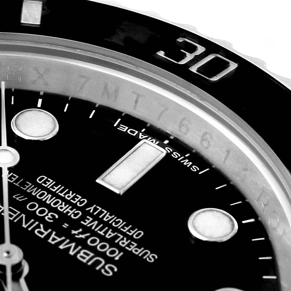 The image shows a close-up of the dial and bezel of a Rolex Submariner 114060 Men's Stainless Steel Black Dial 114060 Men's Stainless Steel Black Dial, highlighting the "30" marker and text details.