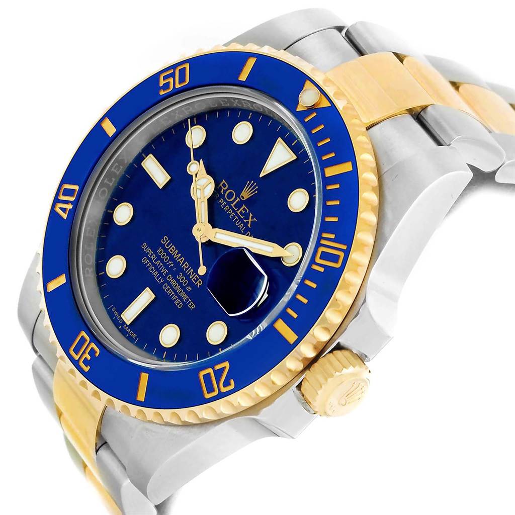 The image shows a close-up angled view of a Rolex Submariner 116613 Men's Steel and Gold (two tone) Blue Dial 116613 Men's Steel and Gold (two tone) Blue Dial watch, displaying its blue dial, blue bezel, and two-tone metal band.