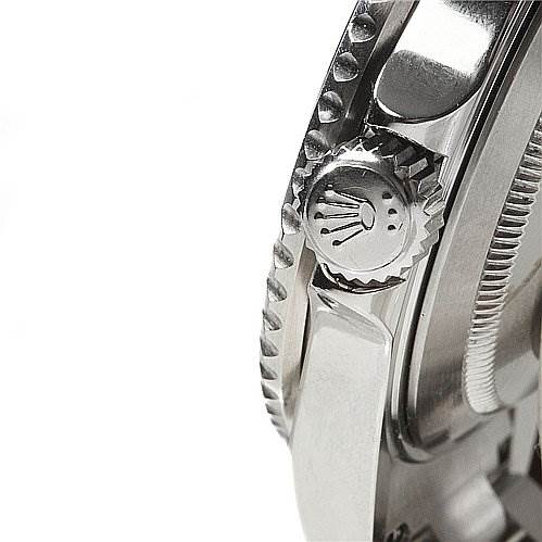 This is a close-up view of the crown and part of the bezel on a Rolex Submariner 16610 Men's Stainless Steel Black Dial 16610 Men's Stainless Steel Black Dial watch.