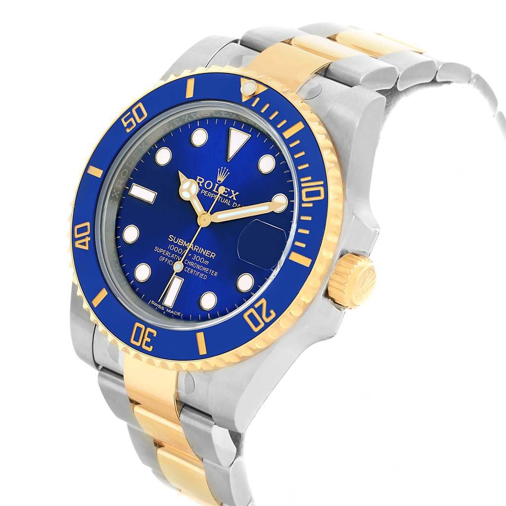 The image shows a Rolex Submariner 116613 Men's Steel and Gold (two tone) Blue Dial 116613 Men's Steel and Gold (two tone) Blue Dial watch at an angle highlighting its face, bezel, crown, and part of the bracelet.