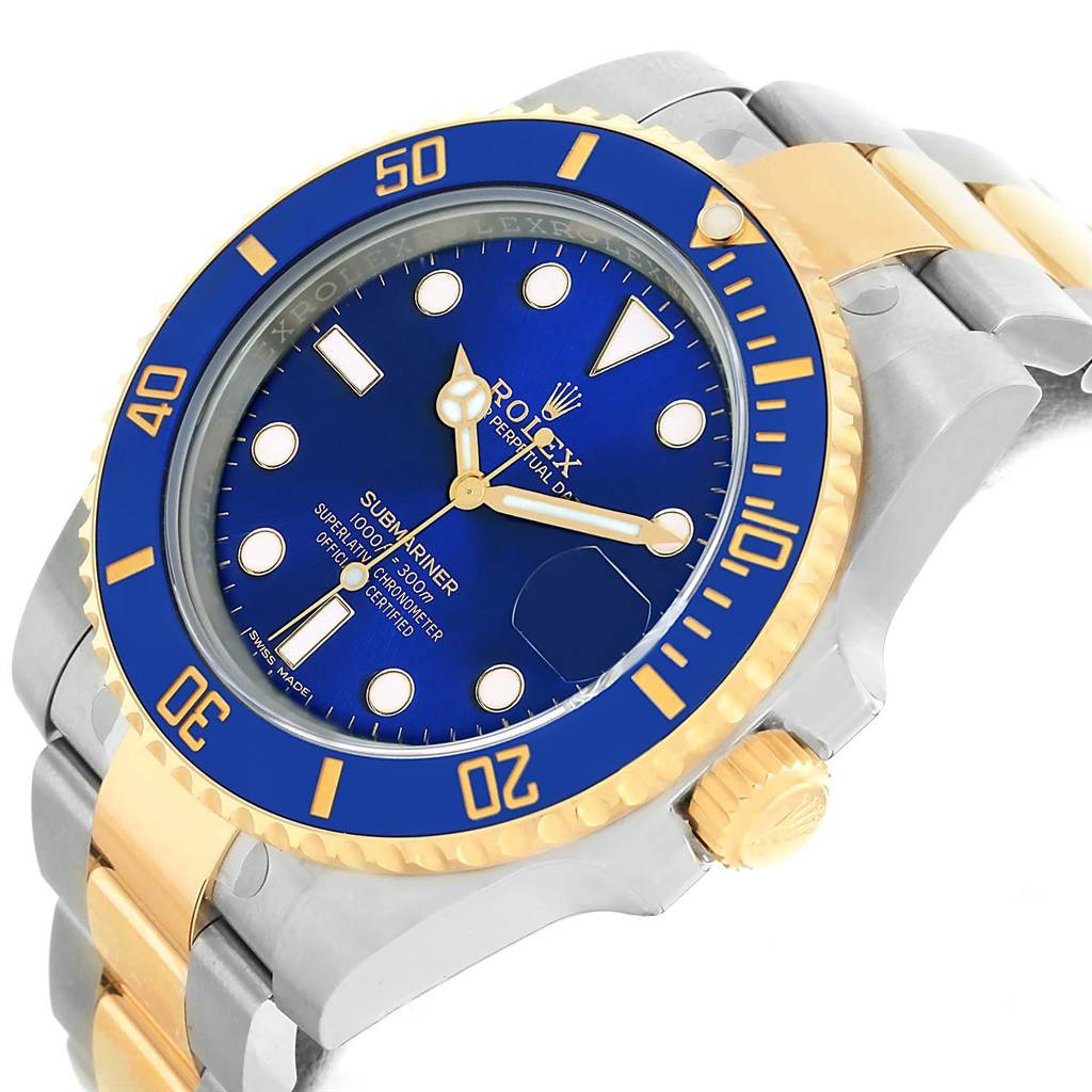 The image shows a Rolex Submariner 116613 Men's Steel and Gold (two tone) Blue Dial 116613 Men's Steel and Gold (two tone) Blue Dial watch at an angle highlighting its blue dial, bezel, and gold/silver bracelet.