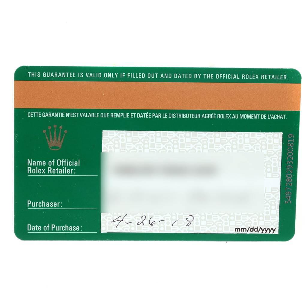 The image shows a guarantee card for a Rolex Submariner 116613 Men's Steel and Gold (two tone) Blue Dial 116613 Men's Steel and Gold (two tone) Blue Dial, featuring the brand name, retailer information, and purchase date.