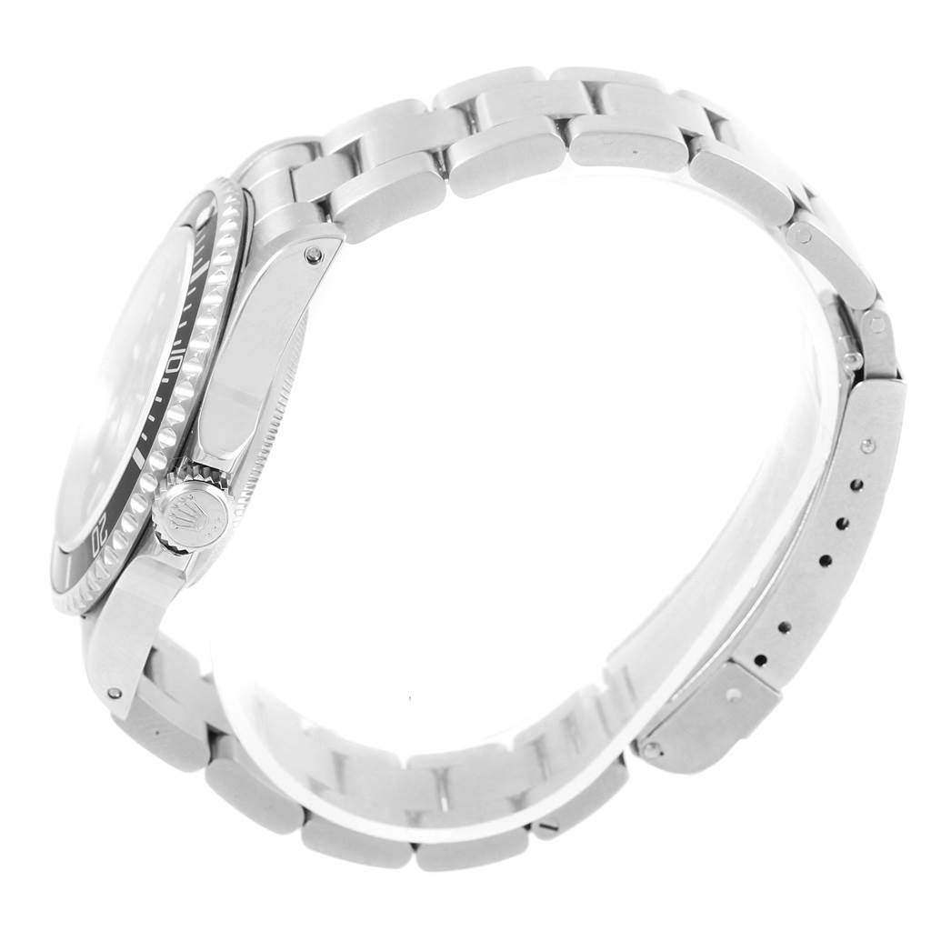 The image shows a side profile of a Rolex Submariner 14060 Men's Stainless Steel Black Dial 14060 Men's Stainless Steel Black Dial watch focusing on the bracelet and side of the case.