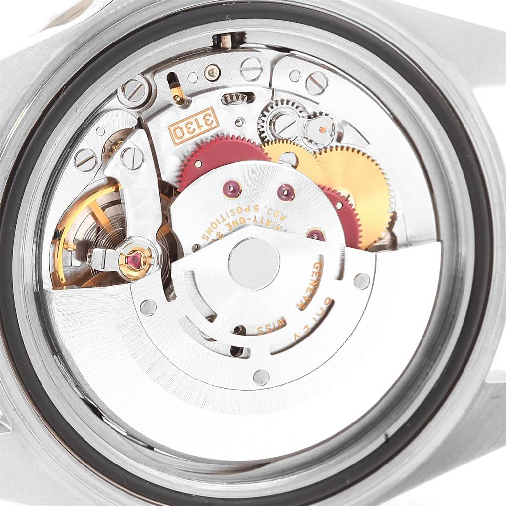 This image displays the internal mechanism of the Rolex Submariner 14060 Men's Stainless Steel Black Dial 14060 Men's Stainless Steel Black Dial watch from a rear angle.