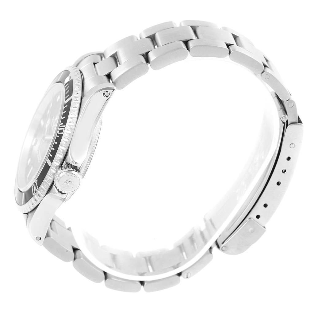 This image shows a side profile of a Rolex Submariner 14060 Men's Stainless Steel Black Dial 14060 Men's Stainless Steel Black Dial watch, highlighting its case, bezel, crown, and bracelet.