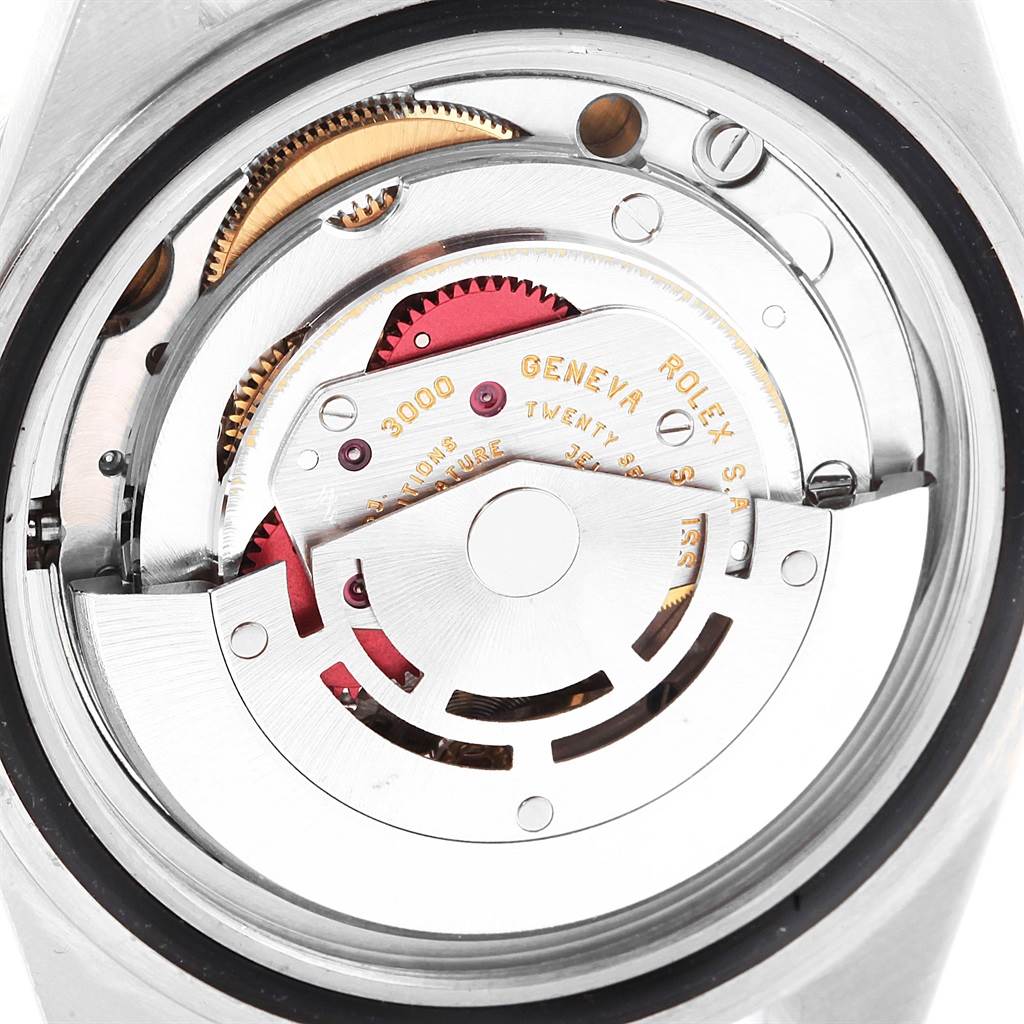 The image shows the internal mechanical movement of the Rolex Submariner 14060 Men's Stainless Steel Black Dial 14060 Men's Stainless Steel Black Dial watch from a back angle.