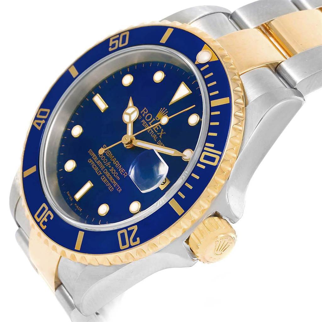 This image shows a side angle of a Rolex Submariner 16613 Men's Steel and Gold (two tone) Blue Dial 16613 Men's Steel and Gold (two tone) Blue Dial watch, highlighting the blue dial, bezel, and two-tone band.