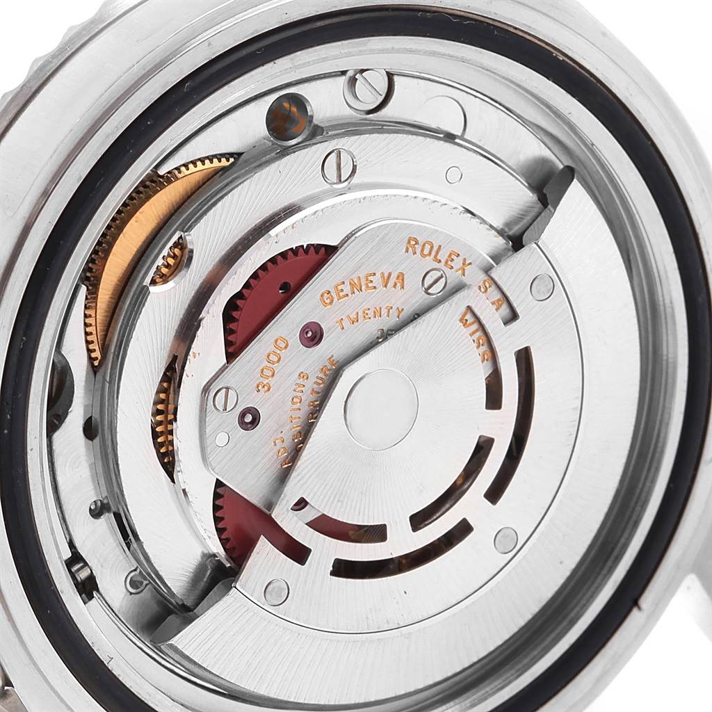 The image shows the inner mechanism and rotor of a Rolex Submariner 14060 Men's Stainless Steel Black Dial 14060 Men's Stainless Steel Black Dial watch from a close-up, detailed angle.