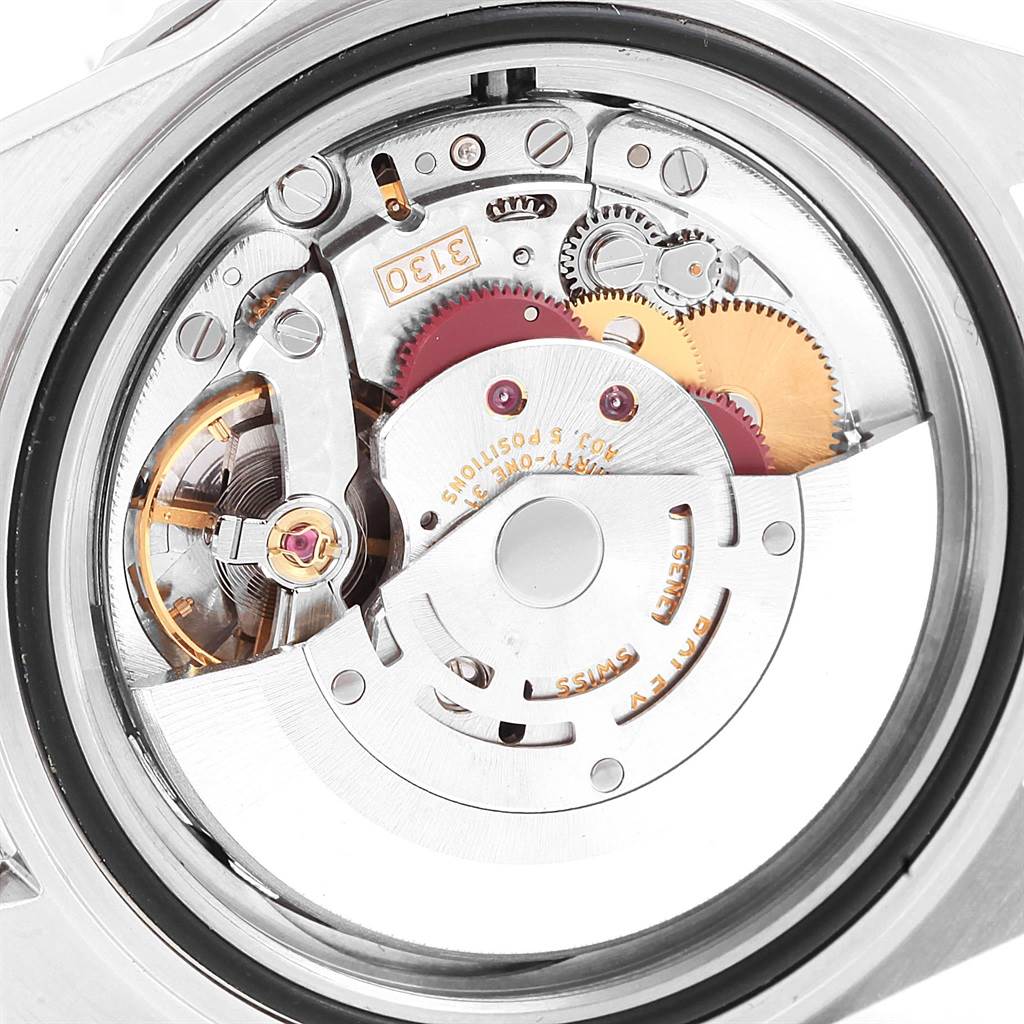 The image shows a close-up view of the movement mechanism of a Rolex Submariner 14060 Men's Stainless Steel Black Dial 14060 Men's Stainless Steel Black Dial watch.