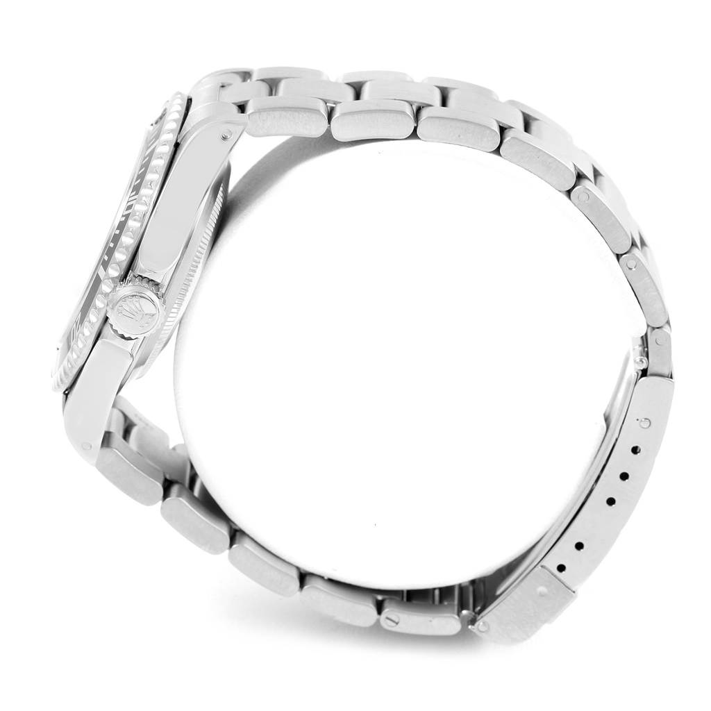 The image shows a side view of a Rolex Submariner 14060 Men's Stainless Steel Black Dial 14060 Men's Stainless Steel Black Dial watch, displaying the crown, case, and part of the bracelet.